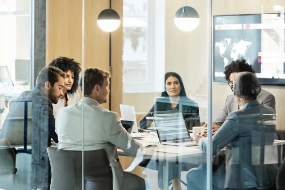 Group of executive working in a small room